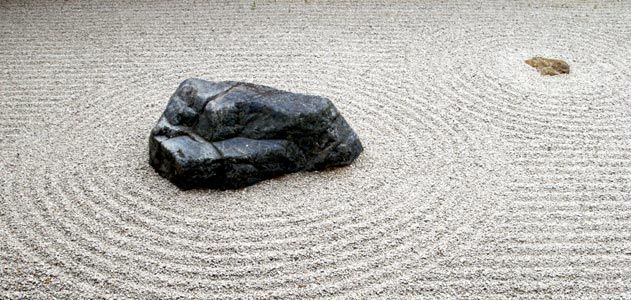 The Symbolism of Stones: Understanding the Role of Rocks in Zen Garden Design